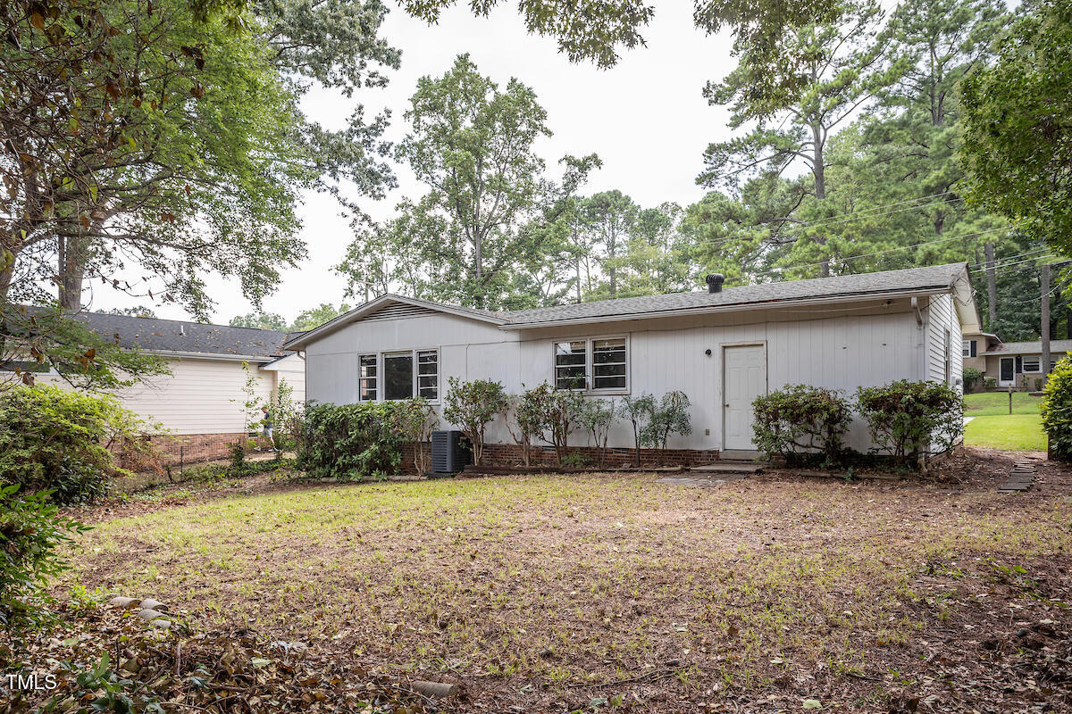 4912 Auburn Road Raleigh, NC 27609 - Photo 19 of 23 a view of a house with a yard