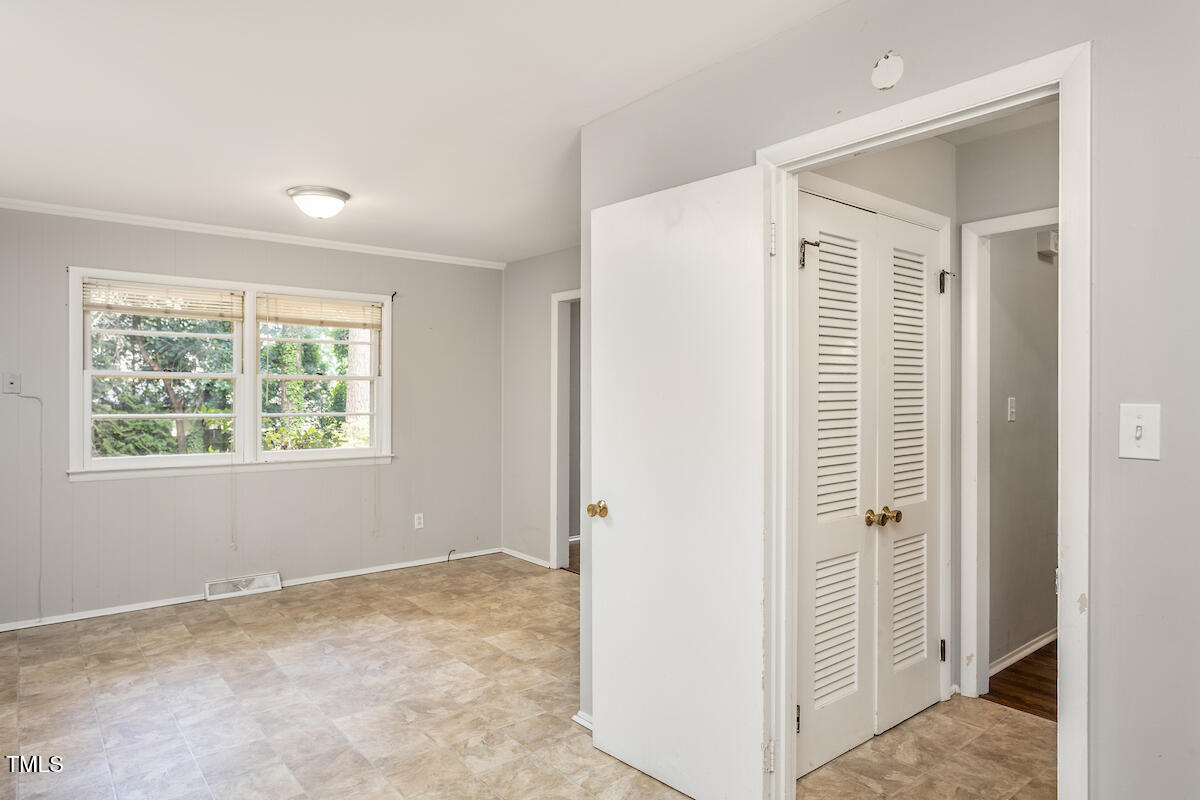 4912 Auburn Road Raleigh, NC 27609 - Photo 6 of 23 a view of a livingroom with a window