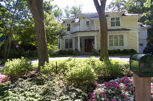 238 Moffett Road Lake Bluff, IL 60044 - Photo 1 of 1 a view of a house with a yard and potted plants