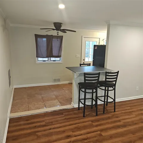 a workspace with furniture and wooden floor