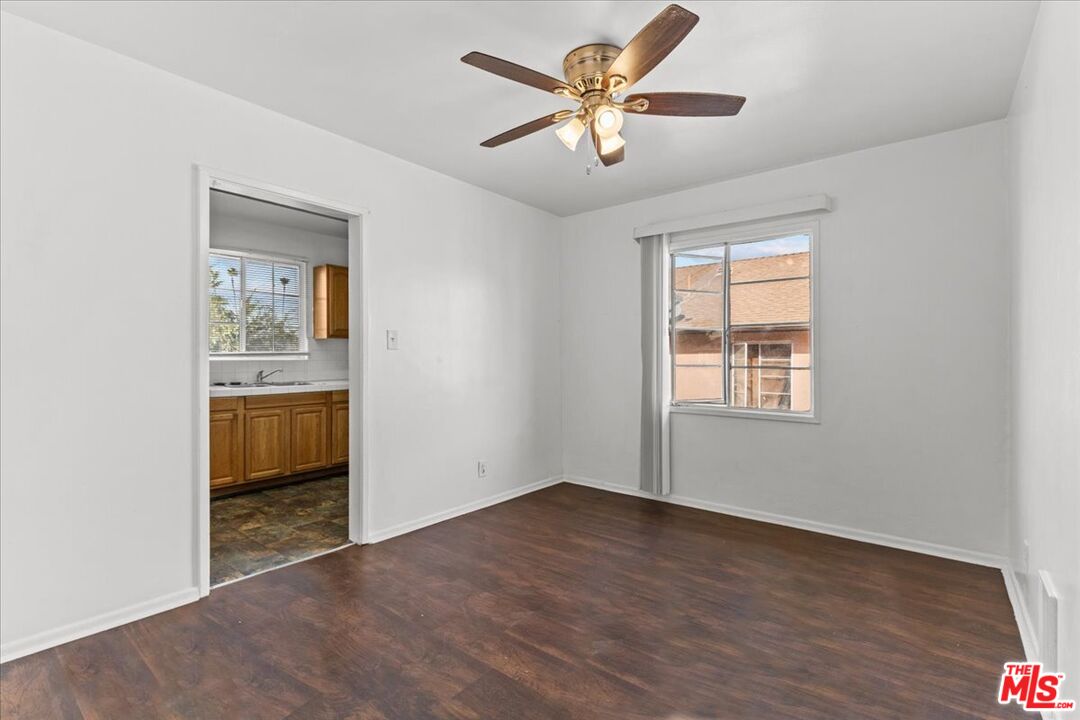 4045 Abourne Road, Unit D Los Angeles, CA 90008 - Photo 11 of 17 wooden floor in an empty room with a window