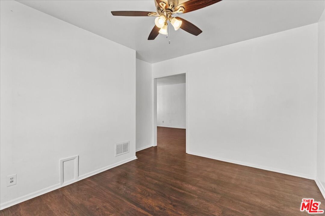 4045 Abourne Road, Unit D Los Angeles, CA 90008 - Photo 10 of 17 a view of an empty room with wooden floor