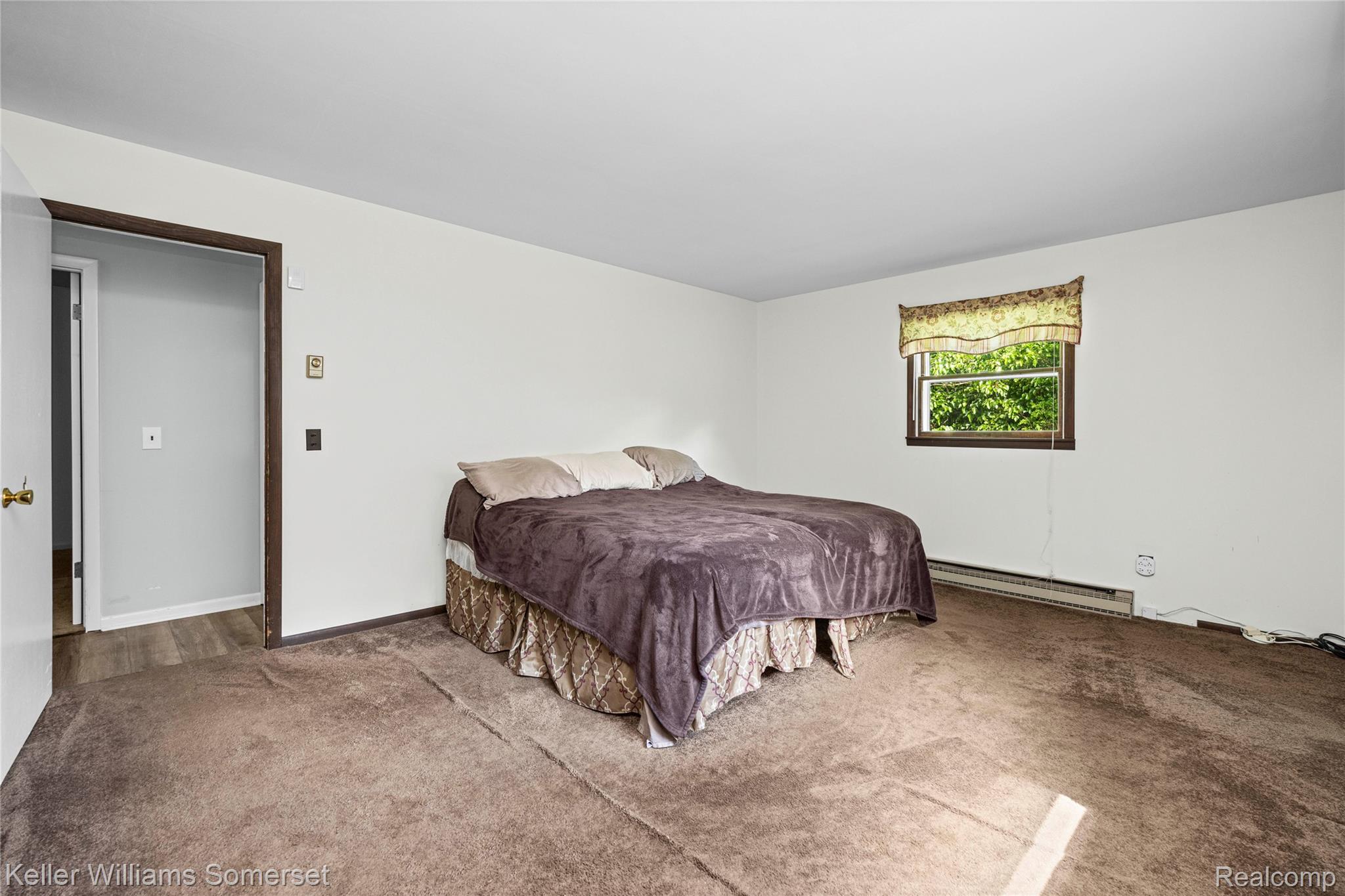 2344 Rochester Road Leonard, MI 48367 - Photo 25 of 66 Carpeted bedroom with a single window featuring a valance