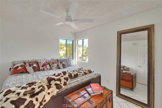 a bathroom with a sink a bathtub and shower