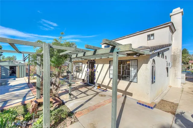 a view of a house with a patio