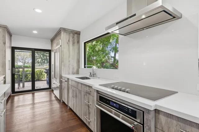 a close view of sink and washing machine