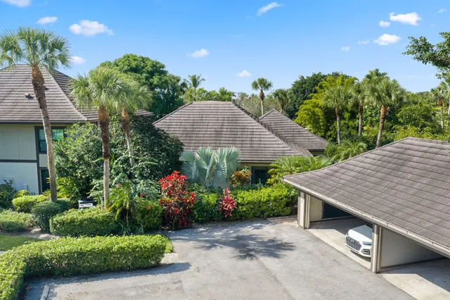 a view of a backyard with garden