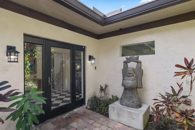 a front view of a house with a porch