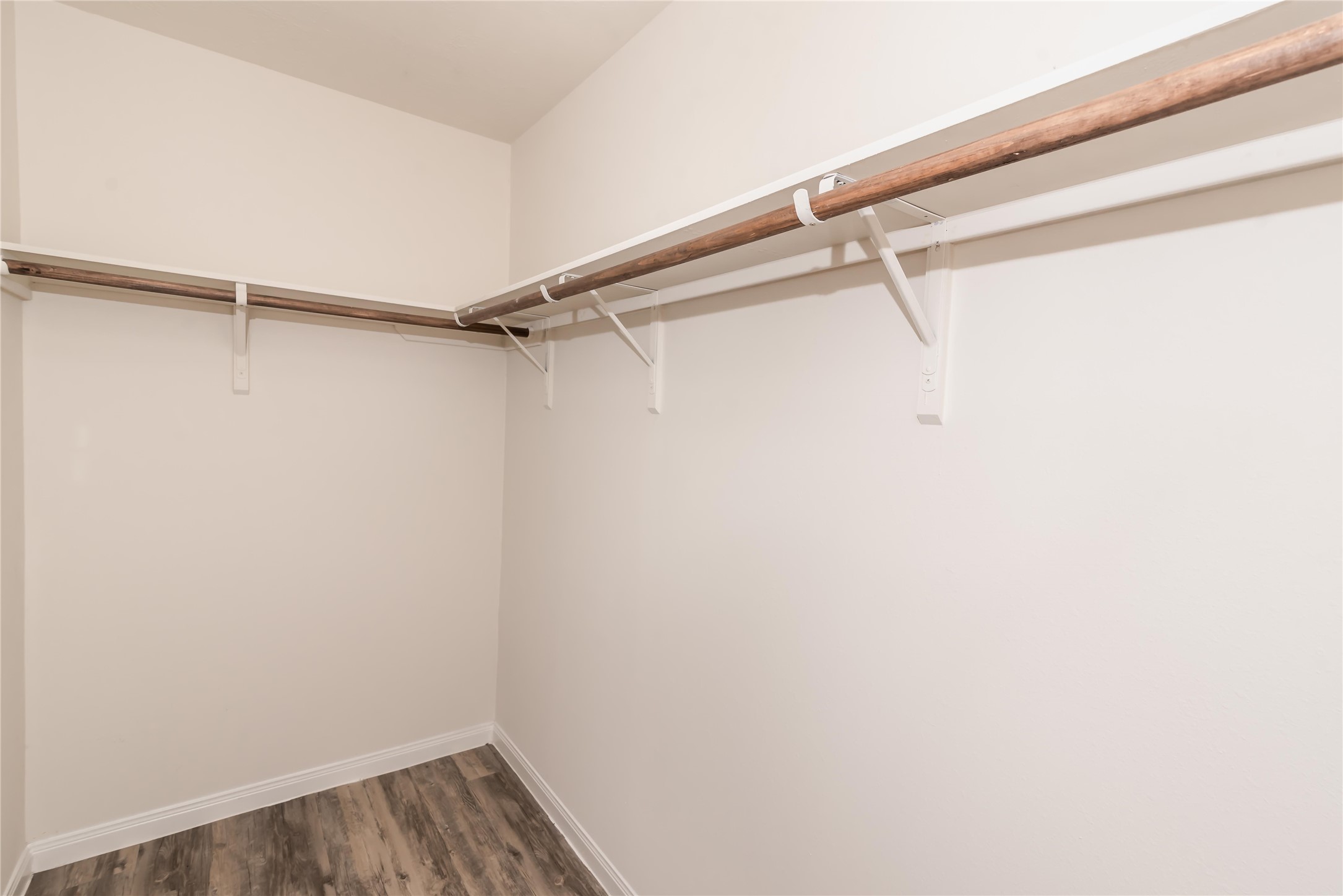 5312 Rio Ramos Street Rosharon, TX 77583 - Photo 10 of 11 a view of a room with racks on the wall