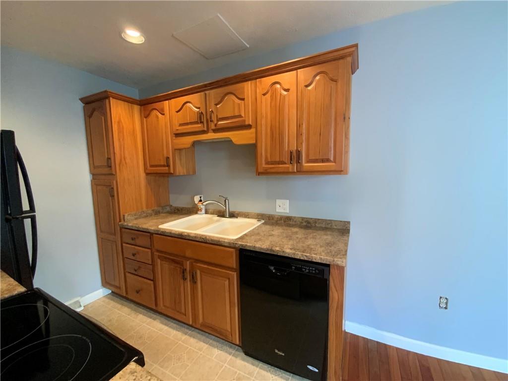 380 3rd Street, Unit 380 Beaver, PA 15009 - Photo 13 of 25 a kitchen with stainless steel appliances granite countertop a sink stove and refrigerator