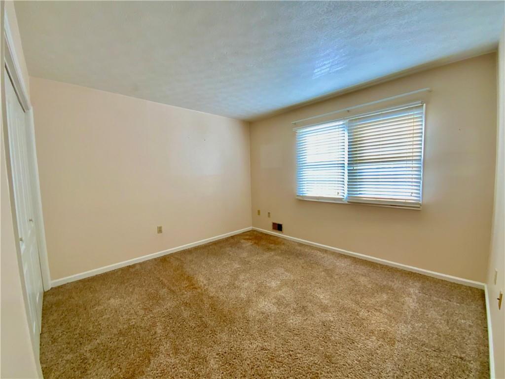 380 3rd Street, Unit 380 Beaver, PA 15009 - Photo 18 of 25 an empty room with a window