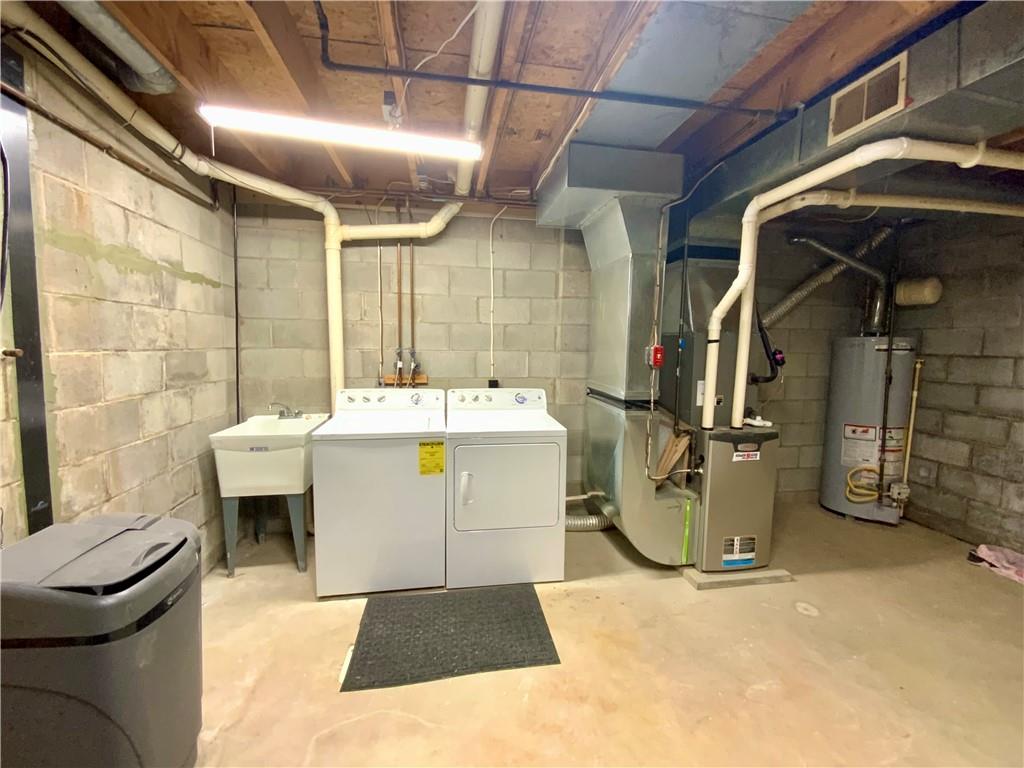 380 3rd Street, Unit 380 Beaver, PA 15009 - Photo 22 of 25 a bathroom with a sink a toilet and shower