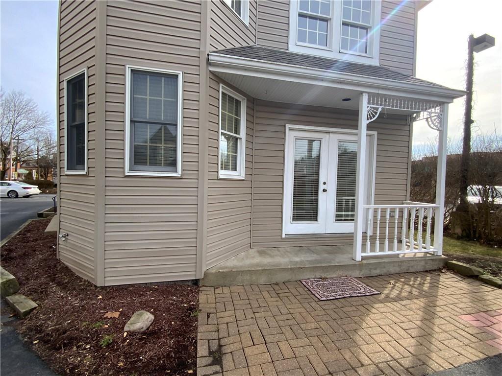 380 3rd Street, Unit 380 Beaver, PA 15009 - Photo 25 of 25 a front view of a house with a yard