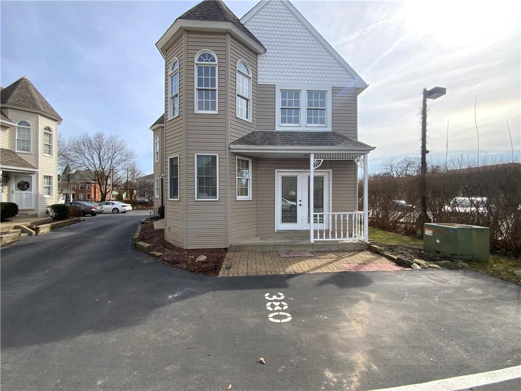 380 3rd Street, Unit 380 Beaver, PA 15009 - Photo 4 of 25 a front view of a house with a yard