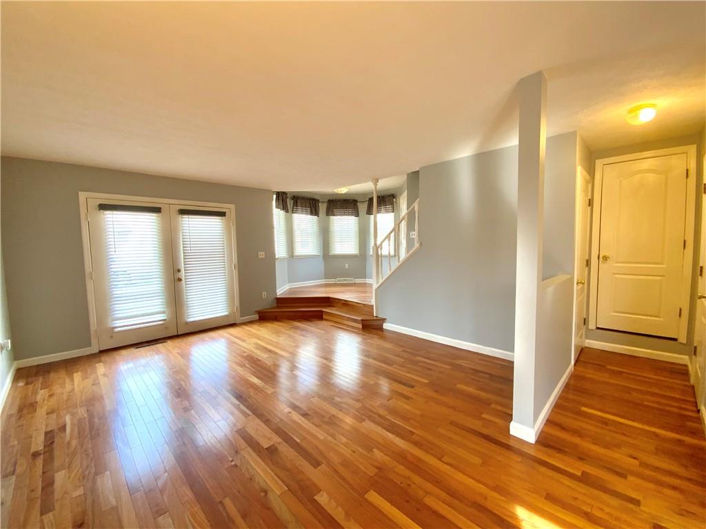 380 3rd Street, Unit 380 Beaver, PA 15009 - Photo 7 of 25 a view of empty room with wooden floor and fan