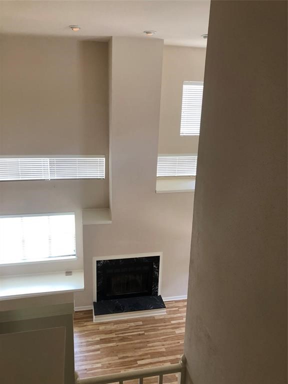 2438 Bering Drive, Unit 2438 Houston, TX 77057 - Photo 15 of 19 a bathroom with a sink and a mirror