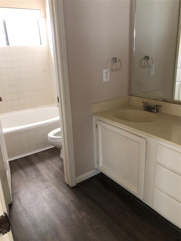 2438 Bering Drive, Unit 2438 Houston, TX 77057 - Photo 19 of 19 a bathroom with a sink and a toilet
