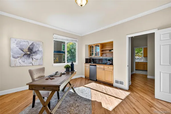 a bed room with a bed and a chandelier