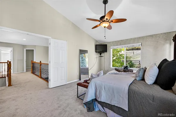 a bathroom with a tub and shower