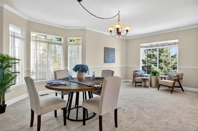 a workspace with furniture and window