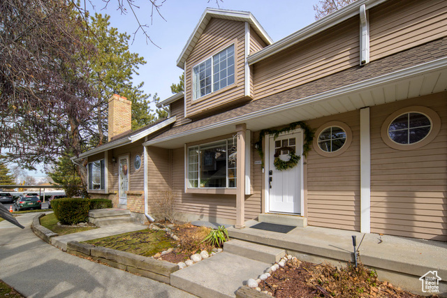 6887 South 595 East Midvale, UT 84047 - Photo 1 of 1 View of front of property featuring covered porch