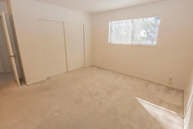 an empty room with windows