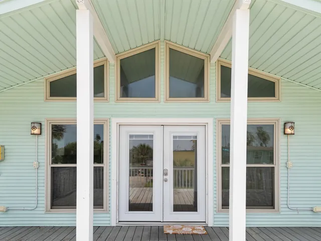 a view of a brick house with front door