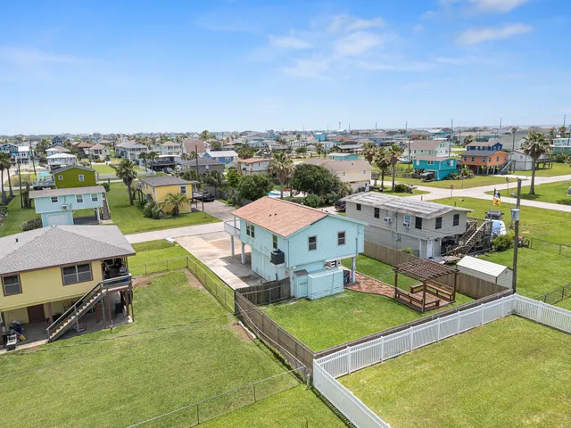 a view of balcony with wooden floor