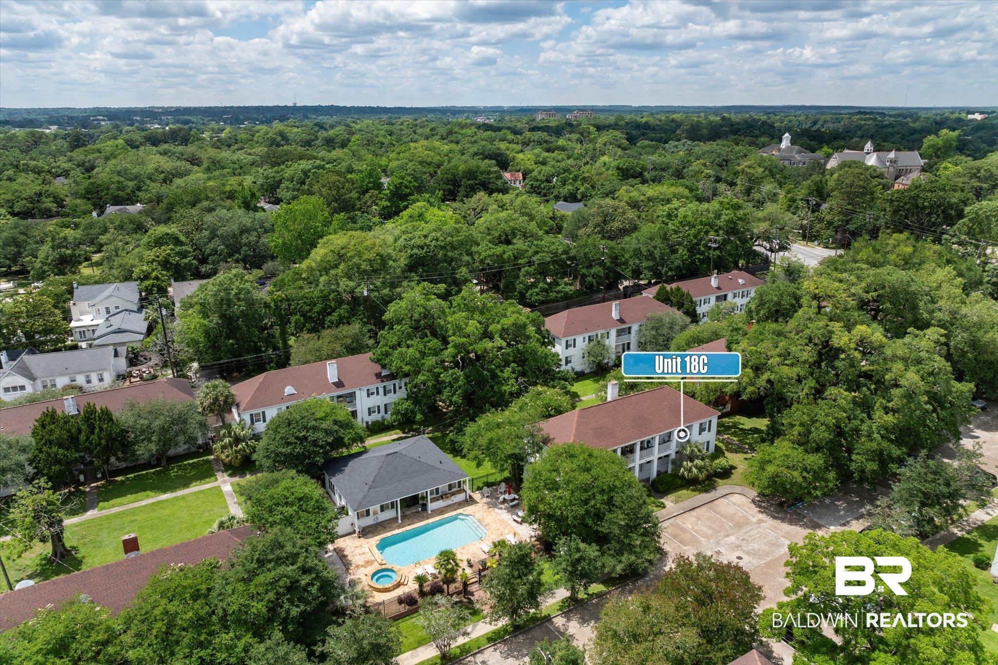 214 Upham Street, Unit 18C Mobile, AL 36607 - Photo 25 of 35 Aerial view of property and surrounding area with a pool