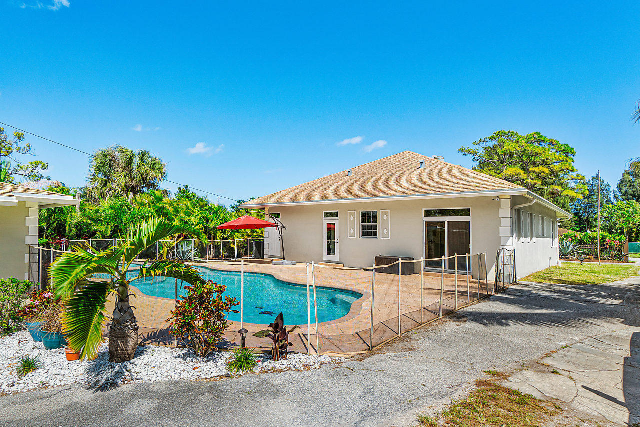 3605 Gulfstream Road Palm Springs, FL 33461 - Photo 1 of 35 a front view of a house with a yard