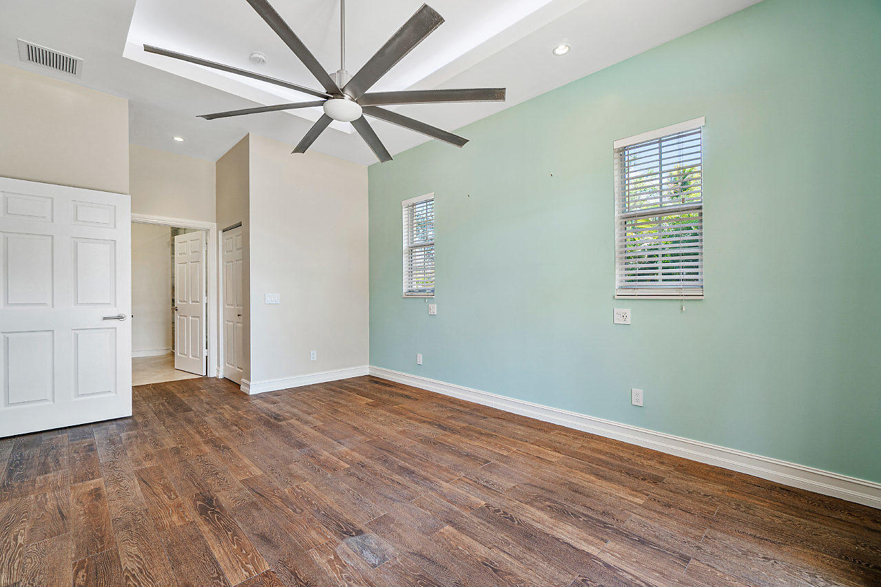 3605 Gulfstream Road Palm Springs, FL 33461 - Photo 13 of 35 wooden floor in an empty room