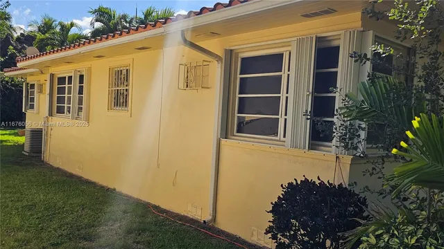 a view of a backyard of a house