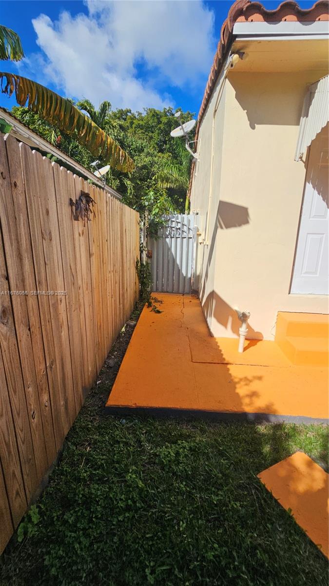 156 Northwest 88th Street El Portal, FL 33150 - Photo 16 of 56 a view of outdoor space and yard