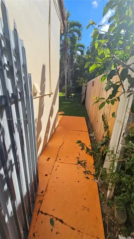 a view of deck with wooden floor and fence