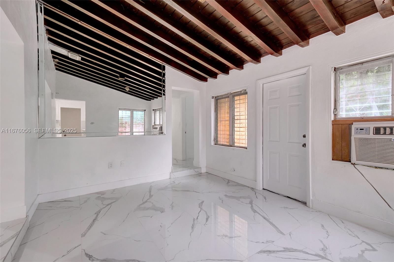 156 Northwest 88th Street El Portal, FL 33150 - Photo 34 of 56 a view of an empty room