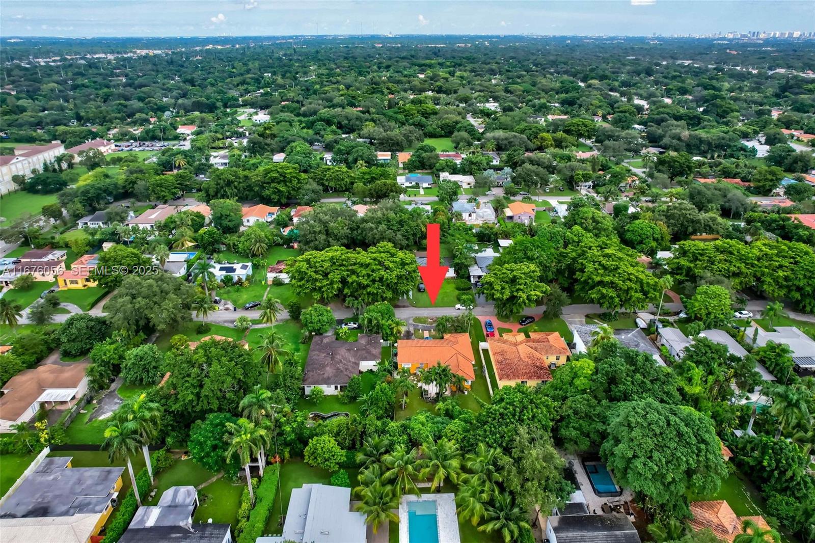 156 Northwest 88th Street El Portal, FL 33150 - Photo 54 of 56 an aerial view of a houses with a yard