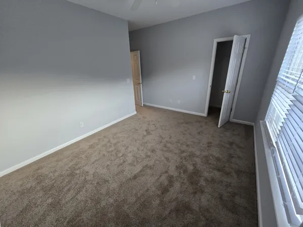 an empty room with windows