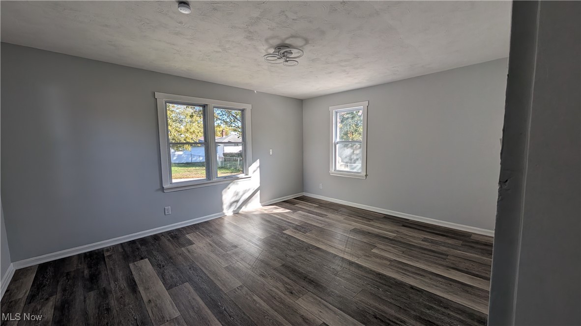 6089 Dunham Road Maple Heights, OH 44137 - Photo 14 of 40 First-floor master bedroom with view of big back yard