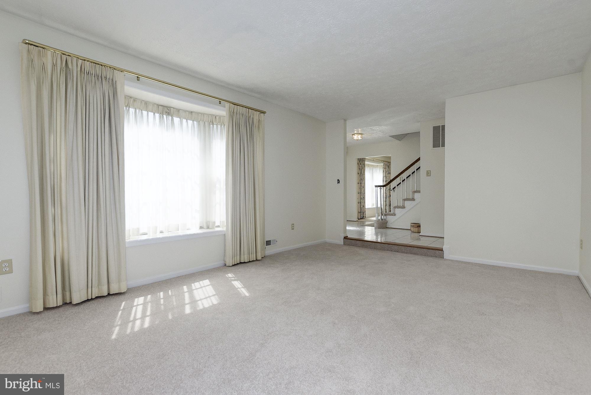 2101 Falling Creek Road Silver Spring, MD 20904 - Photo 15 of 53 Living room with view to foyer