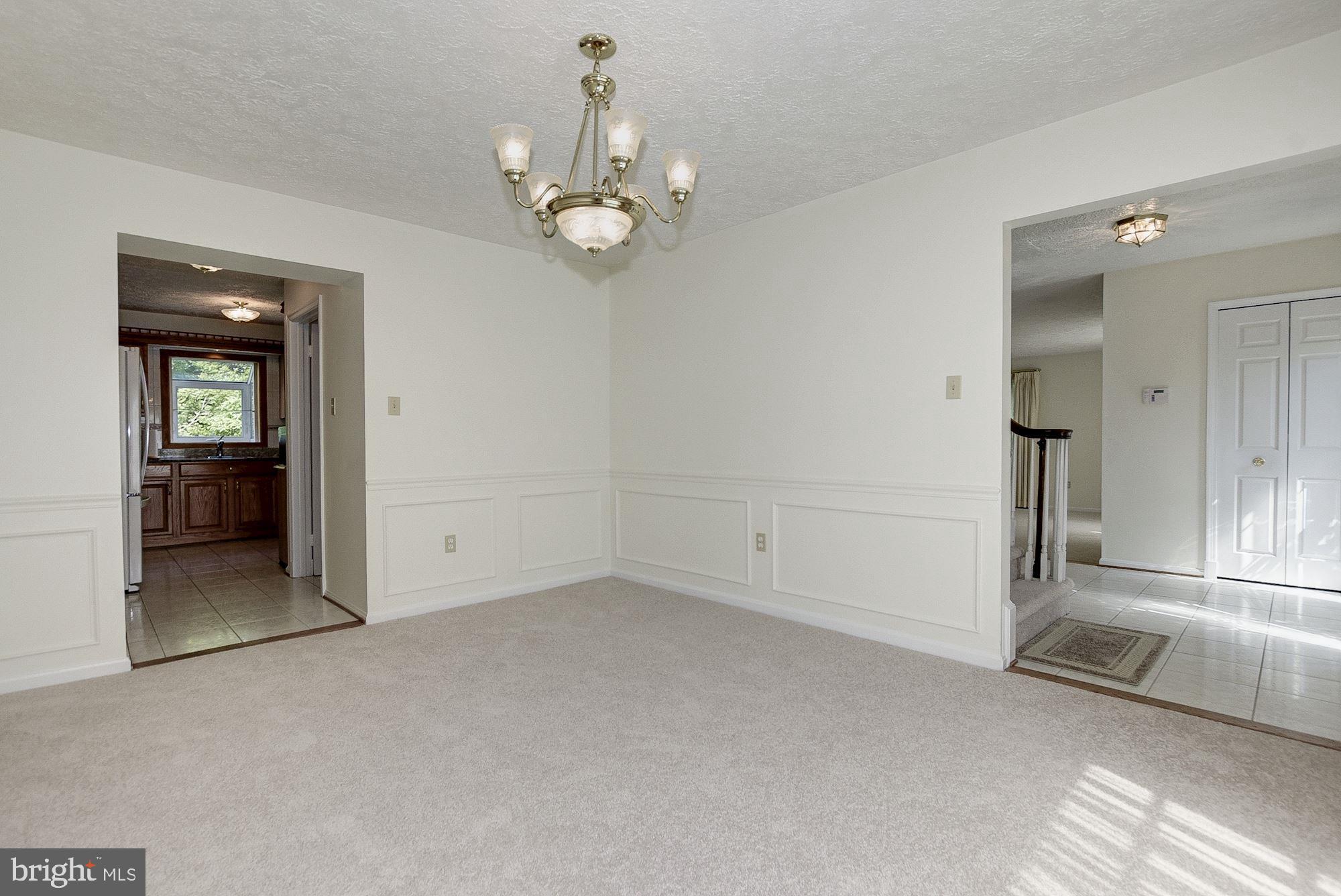 2101 Falling Creek Road Silver Spring, MD 20904 - Photo 18 of 53 Dining room view to foyer fresh paint new carpet