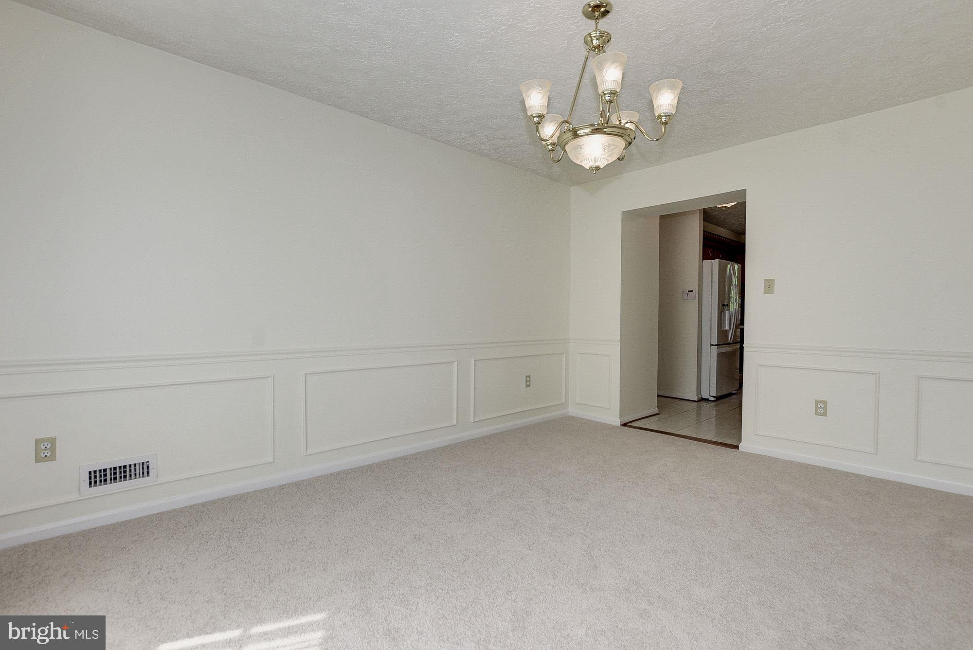 2101 Falling Creek Road Silver Spring, MD 20904 - Photo 20 of 53 Dining room with chair rail and crown