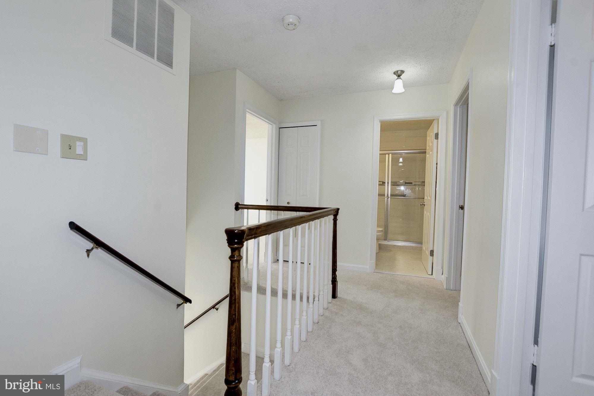 2101 Falling Creek Road Silver Spring, MD 20904 - Photo 32 of 53 Upper hallway new wall to wall & fresh paint