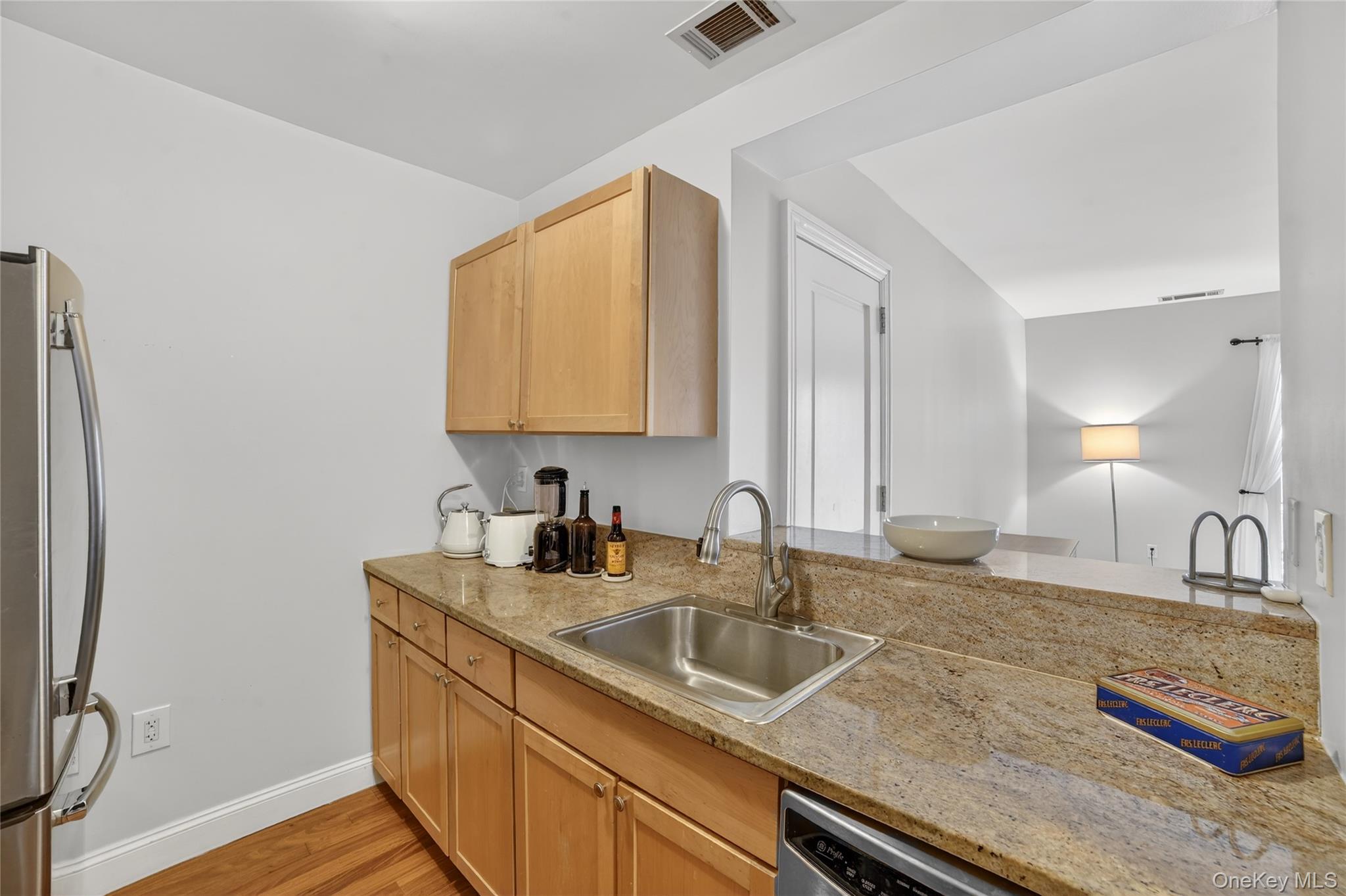 543 Main Street, Unit 502 New Rochelle, NY 10801 - Photo 8 of 31 The kitchen is open to the dining area and living room for ease in entertaining.