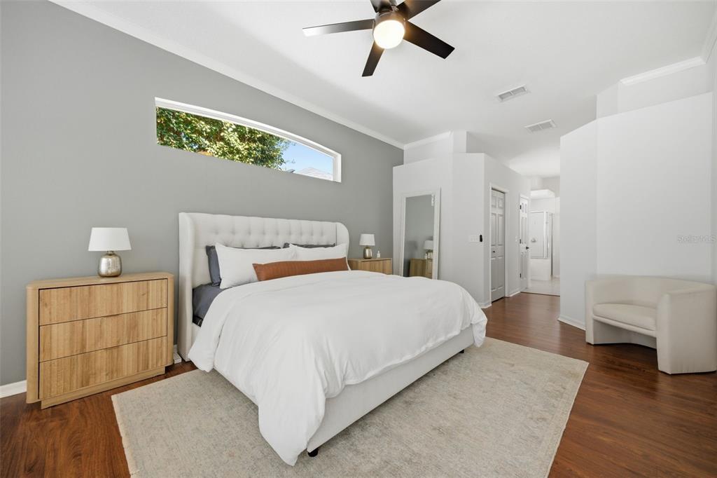 3209 Partridge Point Trail Valrico, FL 33596 - Photo 18 of 66 a bedroom with a bed and a couch