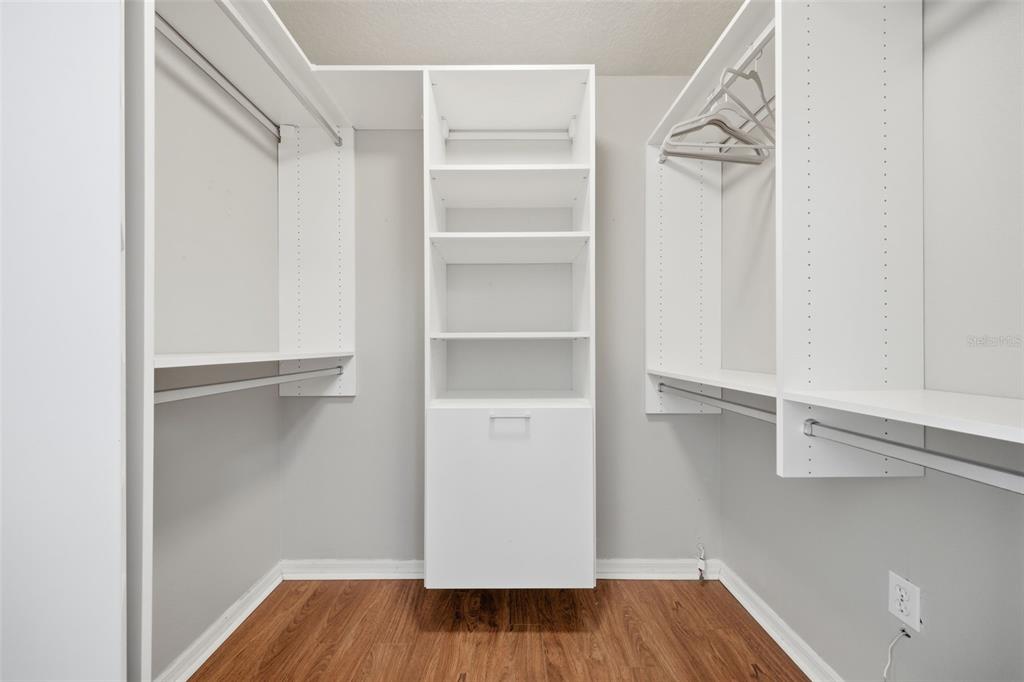 3209 Partridge Point Trail Valrico, FL 33596 - Photo 24 of 66 a view of walk in closet with empty racks
