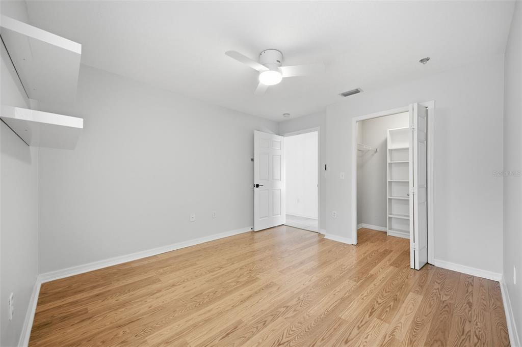 3209 Partridge Point Trail Valrico, FL 33596 - Photo 39 of 66 a view of an empty room with wooden floor