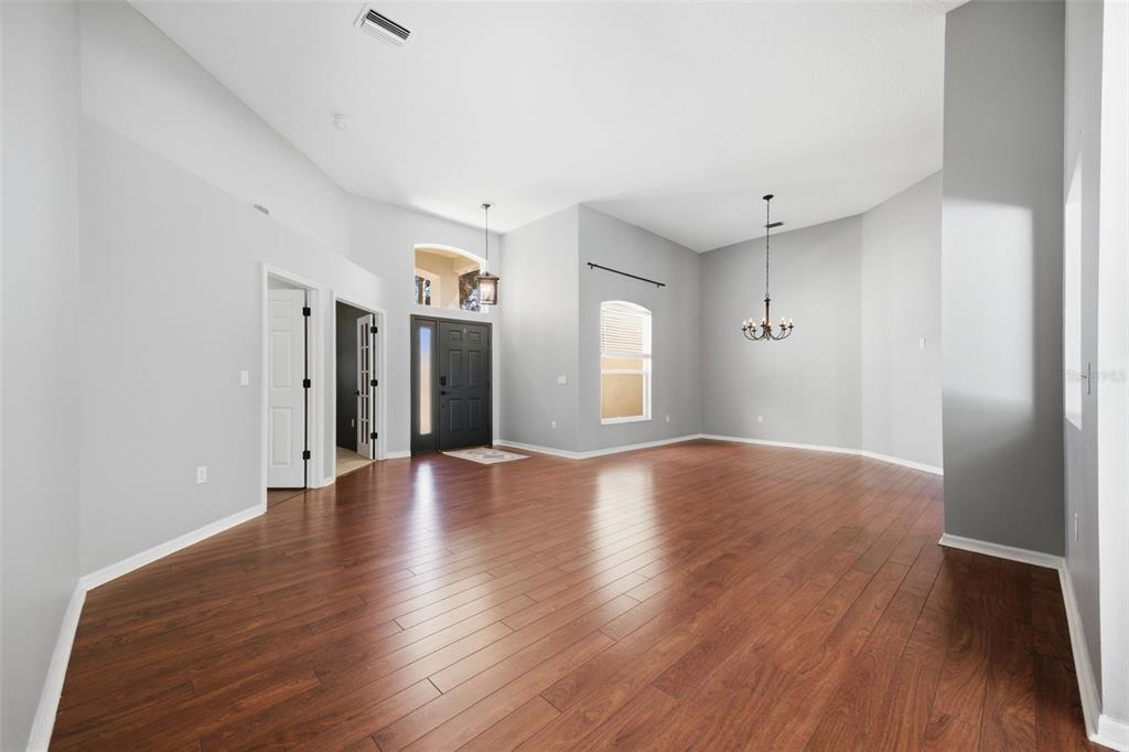 3209 Partridge Point Trail Valrico, FL 33596 - Photo 6 of 66 a view of livingroom with hardwood floor and window
