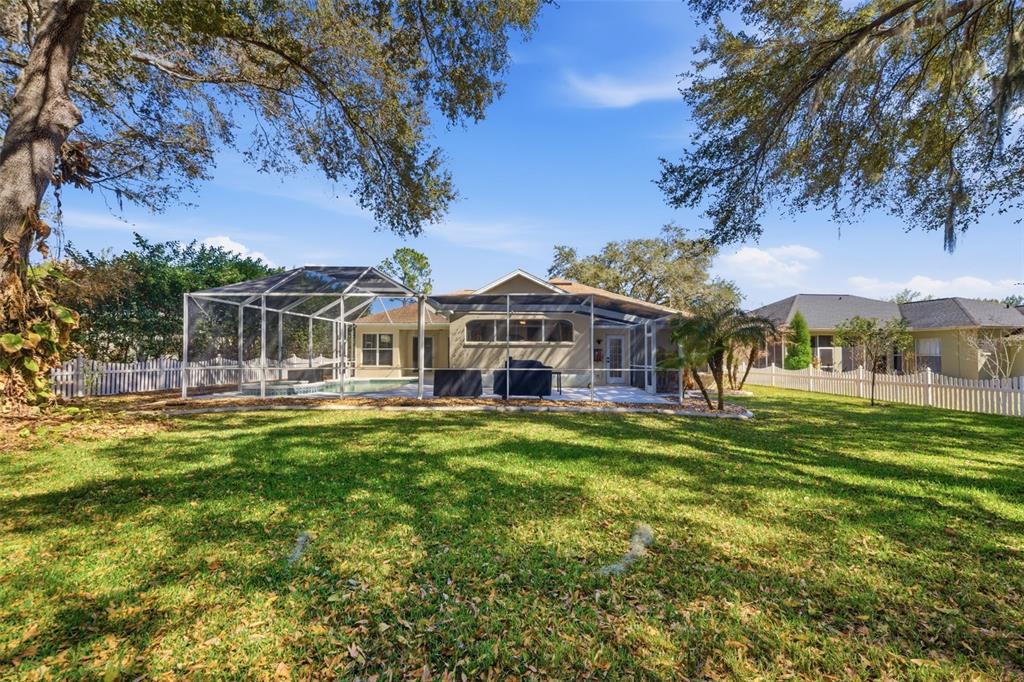 3209 Partridge Point Trail Valrico, FL 33596 - Photo 63 of 66 a front view of house with yard and green space
