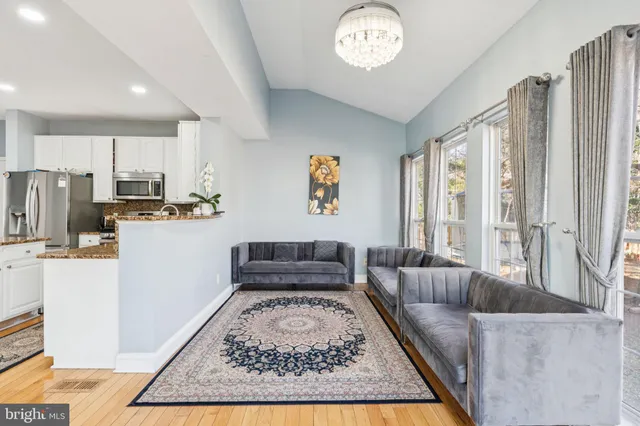 a living room with furniture and a couch