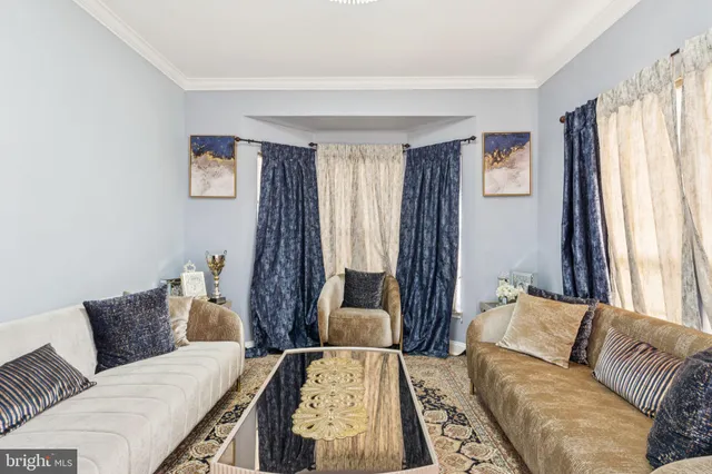 a kitchen with kitchen island granite countertop a sink a counter top space stainless steel appliances and cabinets